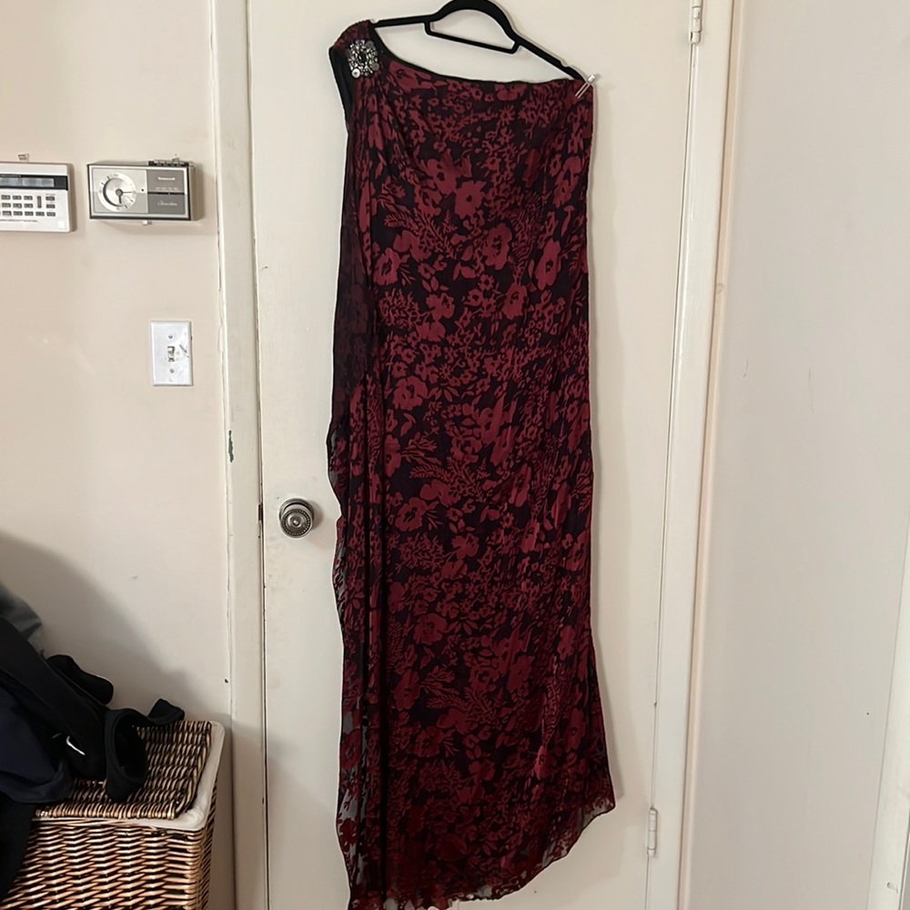 BadgkeyMishka one shoulder burgundy evening maxi dress with floral pattern.
